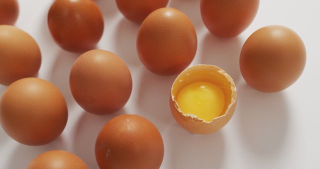 Raw Brown Eggs and Cracked Egg with Yolk - Download Free Stock Images Pikwizard.com