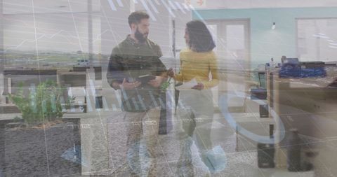 Diverse Colleagues Collaborating with Digital Diagrams Overlay