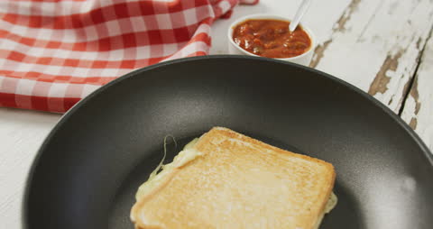Cheesy Toasted Sandwich in Frying Pan with Salsa Dip