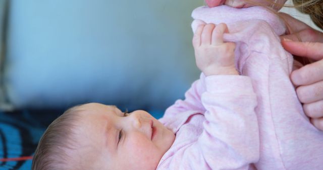 Newborn Smiling in Mother's Arms at Home - Download Free Stock Images Pikwizard.com