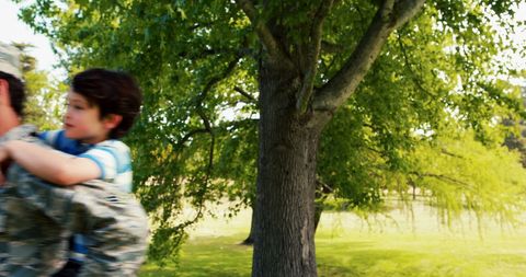 Army Soldier Enjoying Quality Time with Son in Park - Download Free Stock Images Pikwizard.com