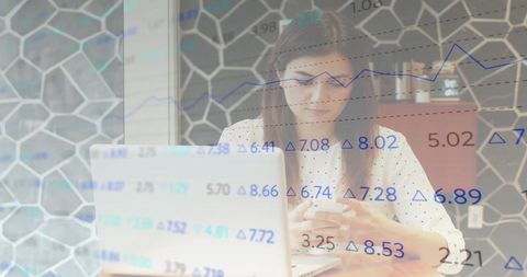 Businesswoman Analyzing Financial Data on Smartphone in Office