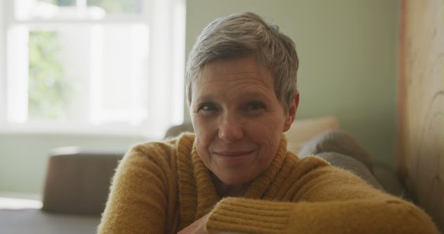 Smiling Woman with Short Gray Hair in Cozy Living Room - Download Free Stock Images Pikwizard.com