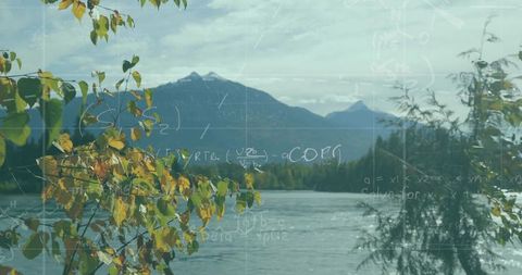Autumn Leaves Framing Mountain Lake with Subtle Math Equations Overlay for Science