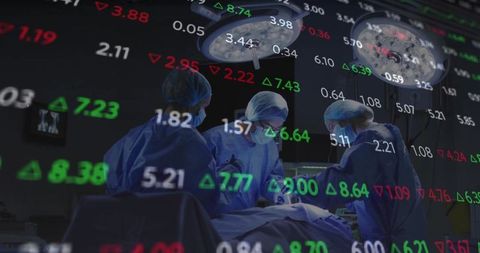 Surgeons performing surgery with financial data overlay