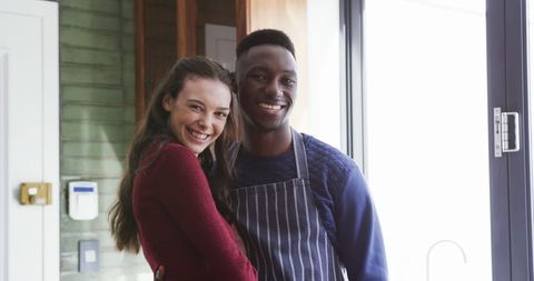 Happy Multicultural Couple Embracing in Cozy Kitchen - Download Free Stock Images Pikwizard.com