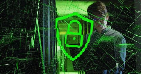 Korean engineer monitoring server racks with neon green cybersecurity shield hologram