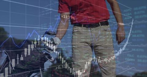 Golfer analyzing financial graphs on golf course