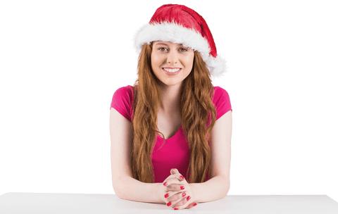 Joyful Redhead Woman Wearing Santa Hat Transparent Background