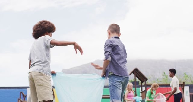 Children Playing Outdoors with Colorful Parachute on Sunny Day - Download Free Stock Images Pikwizard.com