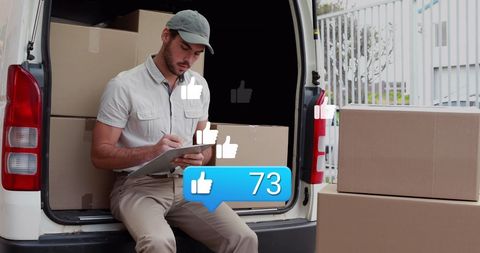 Delivery Man Recording Parcels with Online Like Counts and Notifications - Download Free Stock Images Pikwizard.com