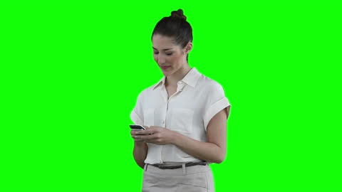 Woman Using Smartphone with Green Screen Background