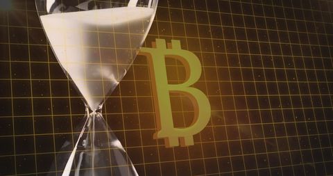 Bitcoin Symbol with Hourglass Representing Cryptocurrency and Time