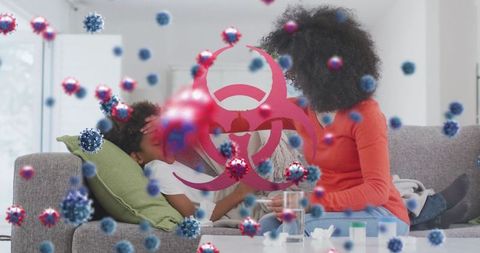 Mother comforting sick child with overlaid virus symbols