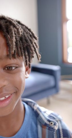 Joyful African American Boy Relaxing Indoors - Download Free Stock Images Pikwizard.com