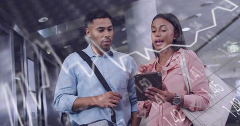 Technology-driven business meeting with digital overlay