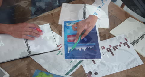 Business Team Analyzing Data Reports and Charts