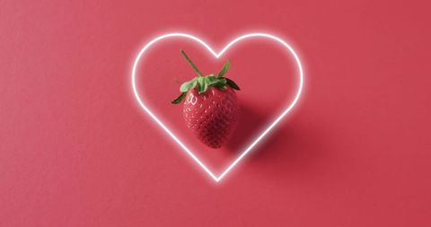 Neon Heart Framing Strawberry on Pink Background - Download Free Stock Images Pikwizard.com