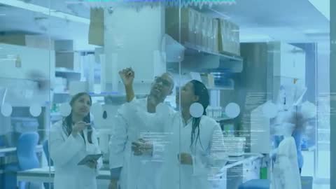 Research Team Collaborating on Data Visualization in Advanced Laboratory