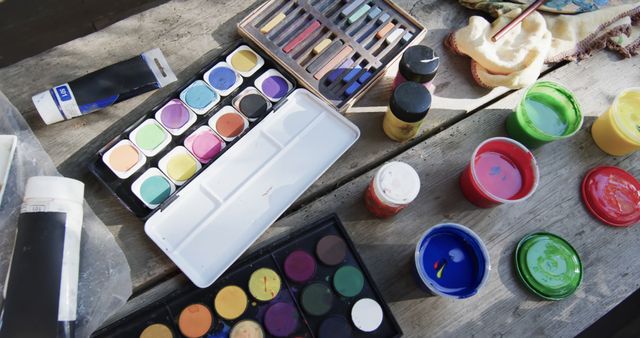 Colorful Art Supplies Organized on Wooden Table - Download Free Stock Images Pikwizard.com