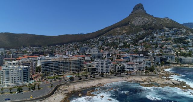 Luxury Coastal Cityscape with Mountain View - Download Free Stock Images Pikwizard.com