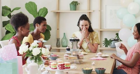 Friends Enjoying Stylish Tea Party Gathering