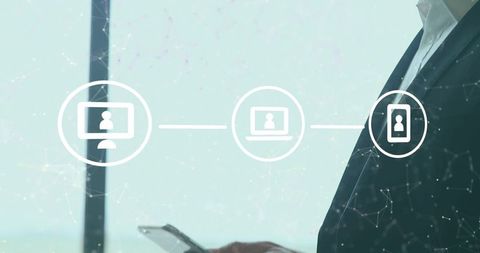 Executive checking smartphone with device sync icons overlay for corporate connectivity