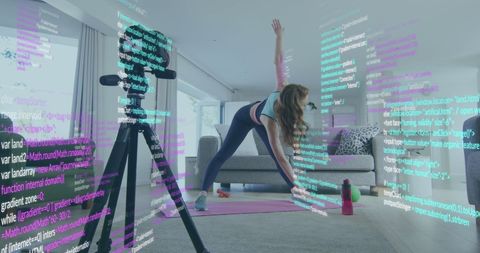 Woman filming home workout amidst digital code overlay