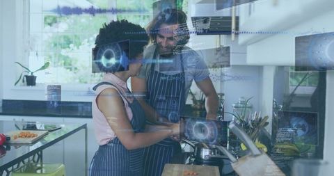 Couple cooking with augmented reality kitchen HUD, modern stovetop and island