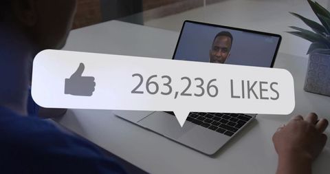 Professional attending video conference receiving online likes