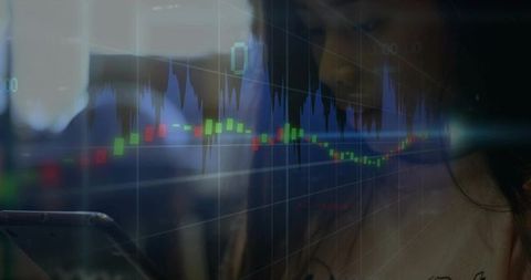 Mixed-race woman analyzing finance chart on smartphone