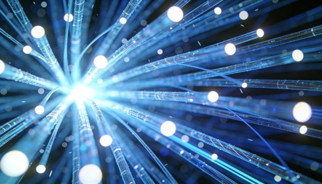 Radiant blue fiber optic burst with floating light orbs, futuristic data stream