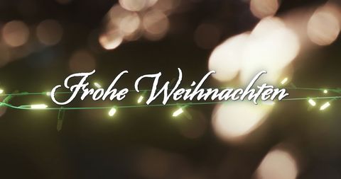 Festive Frohe Weihnachten Text with Glowing Lights