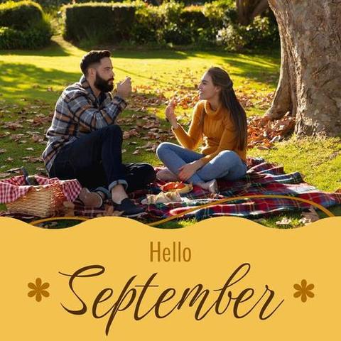 Hello september text in brown on yellow over happy caucasian couple eating food at picnic in park. Celebration of nature and outdoor lifestyle in the first month of autumn digitally generated image.