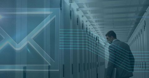 Businessman Analyzing Data Servers with Digital Envelope Overlay