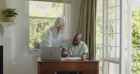 Couple Sharing Quiet Moment with Technology in Bright Room
