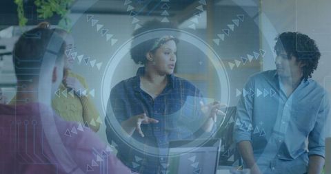 Team Colleagues Engaging in Innovative Office Discussion