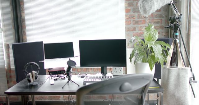 Modern home office setup with multiple monitors and recording equipment - Download Free Stock Images Pikwizard.com