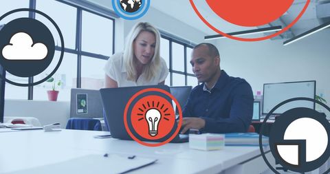 Creative Team Collaboration in Modern Office with Digital Graphics