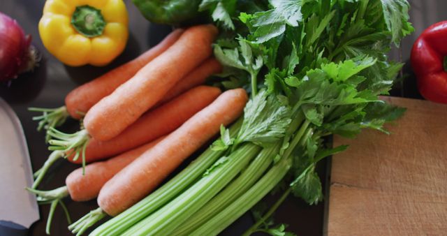 Fresh Vegetables on Kitchen Counter with Carrots and Celery - Download Free Stock Images Pikwizard.com