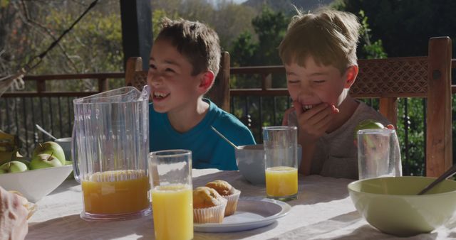 Children Laughing While Enjoying Breakfast Outdoors - Download Free Stock Images Pikwizard.com