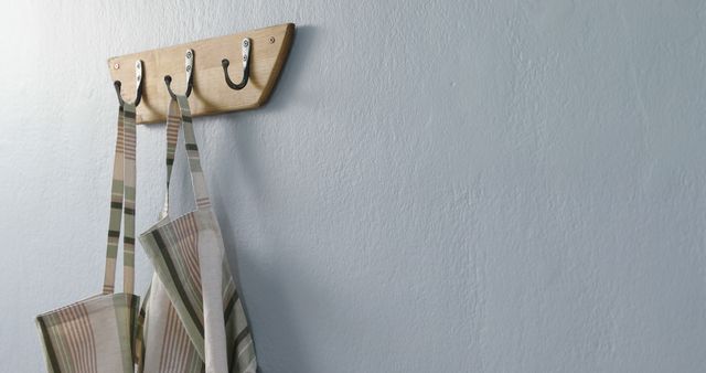 Aprons Hanging on Wall Hooks - Download Free Stock Images Pikwizard.com