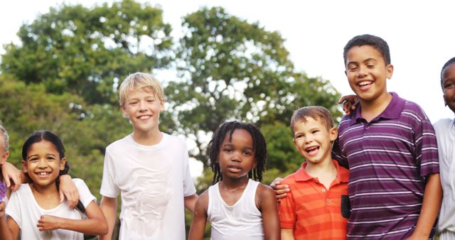 Diverse group of happy children playing outdoors - Download Free Stock Images Pikwizard.com