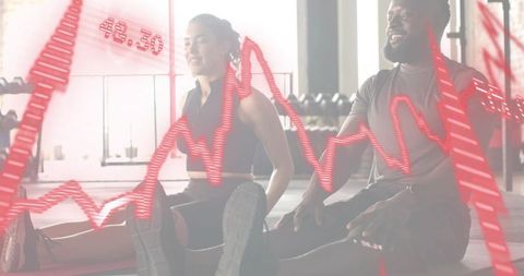 Fitness partners stretching with red heart rate overlay in bright gym