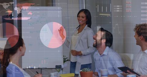 Business team in meeting with digital infographics overlay