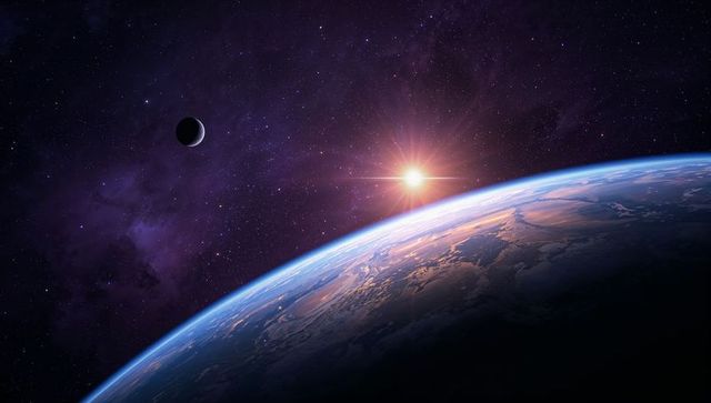 Spectacular View of Earth's Horizon with Rising Sun and Cosmic Background