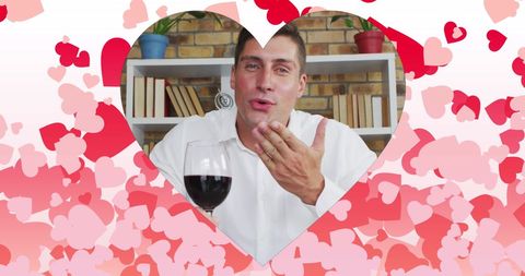 Man Blowing Kiss Surrounded by Romantic Hearts