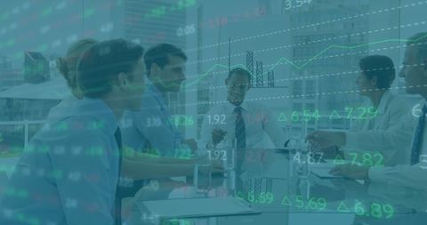 Business team analyzing financial growth charts