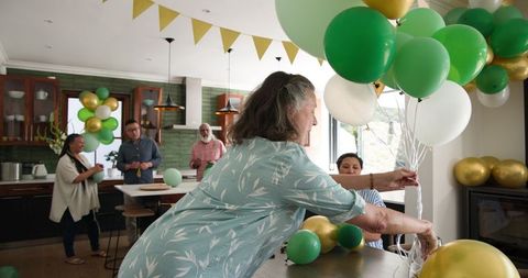 Seniors Decorate Home with Balloons for Party Celebration