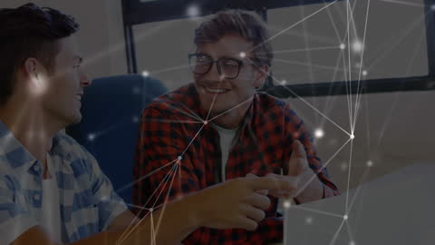 Happy Caucasian Male Coworkers Networking in Technology Office